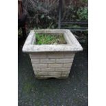 A SQUARE BRICK WORK PLANTER PLUS CONTENTS H-36 CM