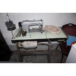 A JANOME INDUSTRIAL SEWING MACHINE AND STAND - HOUSE CLEARANCE