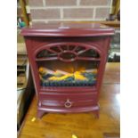 A SMALL ELECTRIC HEATER - HOUSE CLEARANCE