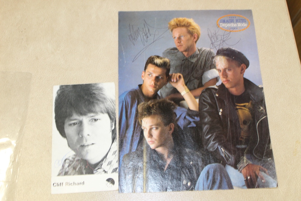 A COVER OF A SMASH HITS ALBUM AUTOGRAPHED BY DEPECHE MODE TOGETHER WITH A SIGNED PHOTOGRAPH OF CLIFF