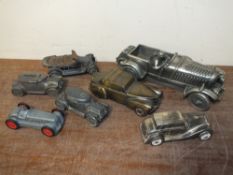 A COLLECTION OF VINTAGE METAL CAR MODELS, to include a 'Compulsion' sculpture of a vintage