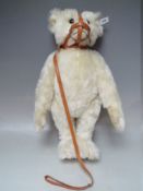 A STEIFF LIMITED MOHAIR 'MUZZLE BEAR 1908', number 3232 of 5000, button in ear, white tag 0174/46,