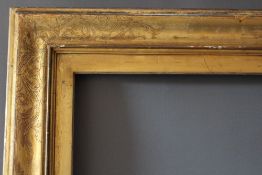 A 19TH CENTURY CONTINENTAL DECORATIVE GOLD FRAME WITH GOLD SLIP, frame W 6.5 cm, slip rebate 77.5 cm