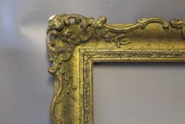 A PAIR OF TWENTIETH CENTURY SWEPT FRAMES, width of frame 8.5 cm, rebate 57 x 46 cm (2)