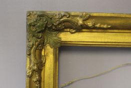 A NINETEENTH CENTURY GOLD FRAME, with corner embellishments, width of frame 7 cm, rebate 44 x 37 cm