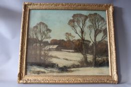 EDGAR THOMAS HOLDING (1870-1952). A winter wooded landscape with farmstead, 'Winter at Sutton' see