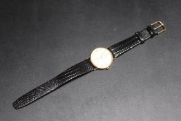 A HALLMARKED GOLD SOVEREIGN WATCH, on leather strap, unused and in box, W 3.25 cm