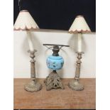 A CAST METAL HANGING OIL LAMP, overall H 81 cm, together with a table oil lamp with blue ceramic