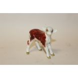 A SMALL BESWICK HEREFORD CALF FIGURE, facing right