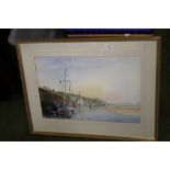 A FRAMED AND GLAZED WATERCOLOUR OF A HARBOUR SCENE