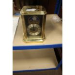 A HEAVY BRASS HERMLE MANTEL CLOCK