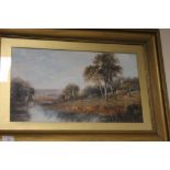 AN ANTIQUE OIL ON BOARD OF A RURAL LANDSCAPE IN GILT FRAME 70 CM X 49 CM