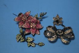 TWO BOXED "BUTLER & WILSON" BROOCHES (2)