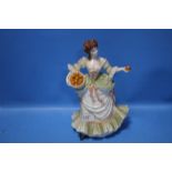 A COALPORT FIGURINE - "NELL GWYNNE"