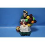 A ROYAL DOULTON FIGURINE - "THE OLD BALLOON SELLER"