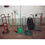 A SELECTION OF GARDEN TOOLS WITH AN ELECTRIC MOWER