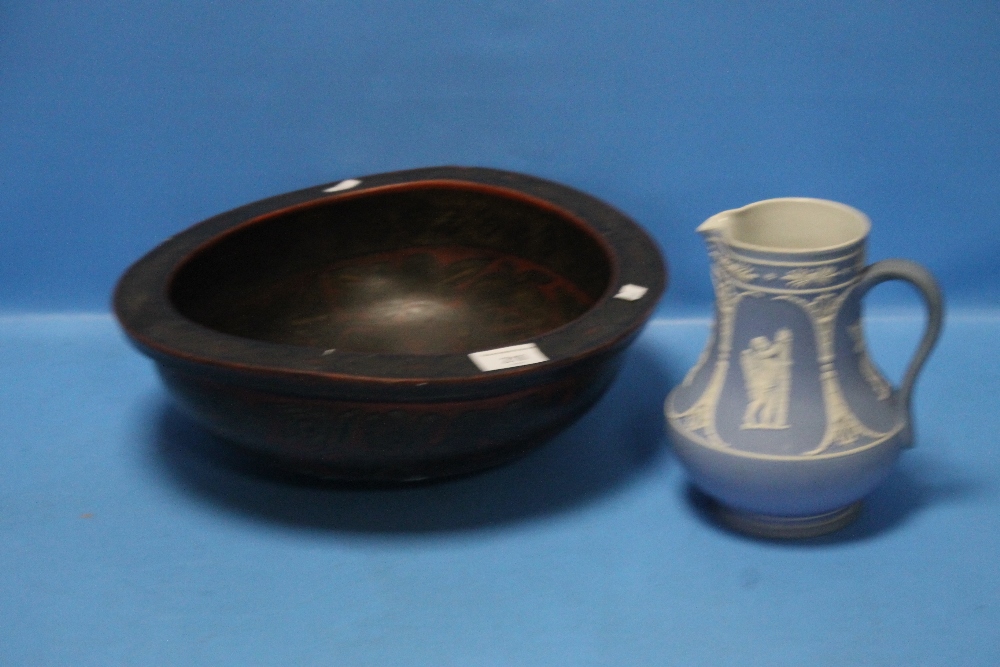 AN UNUSUAL HAND PAINTED PAPIER MACHE BOWL TOGETHER WITH A VICTORIAN JASPERWARE JUG (2)