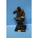 A COLD CAST BRONZE FIGURE OF A PIANIST