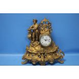 AN ANTIQUE GILT METAL MANTEL CLOCK A/F