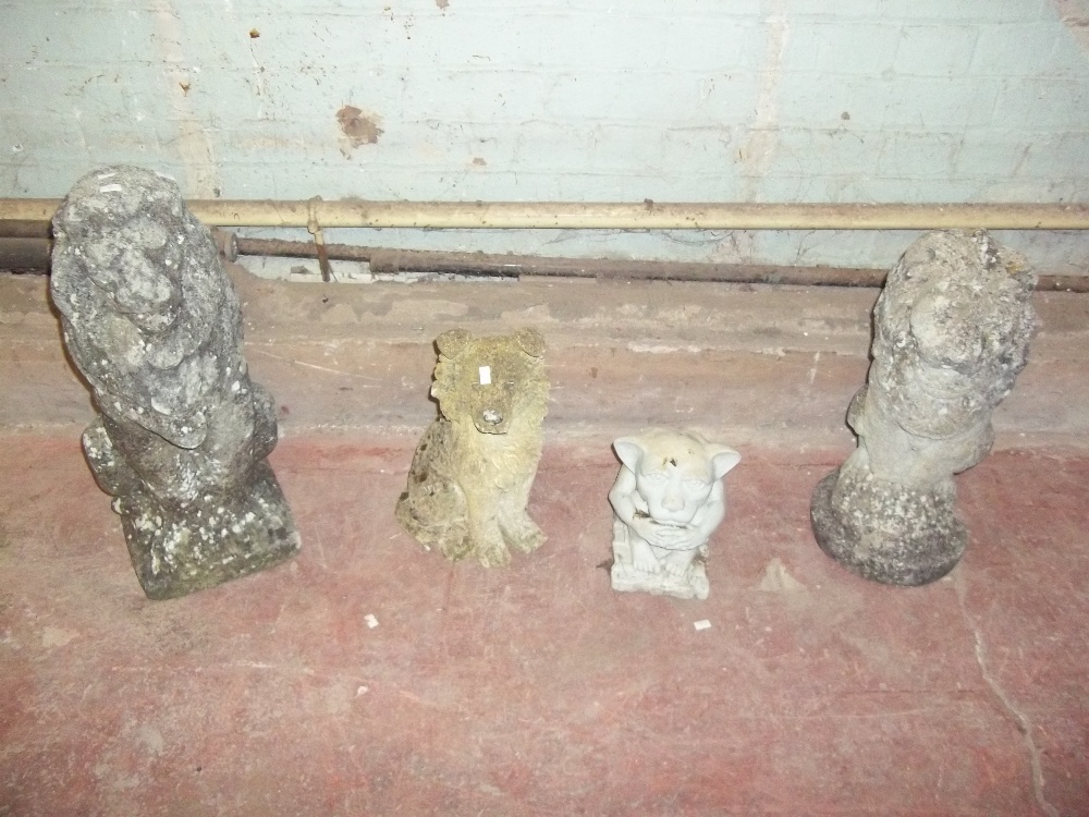 THREE GARDEN STATUES, TWO LIONS, A DOG AND A RESIN GHOUL