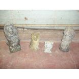 THREE GARDEN STATUES, TWO LIONS, A DOG AND A RESIN GHOUL