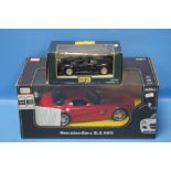 AN AMG BOXED MODEL OF A MERCEDES BENZ AND A MAISTO MODEL OF A JAGUAR 220 (2)