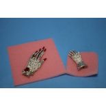 TWO BOXED "BUTLER & WILSON" HAND BROOCHES (2)