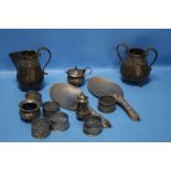 A QUANTITY OF INDIAN WHITE METAL TO INCLUDE A CRUET, NAPKIN RINGS, JUG AND BOWL, SERVERS ETC.,