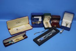 A QUANTITY OF ASSORTED LADIES AND GENTLEMANS WRIST WATCHES AND A BOXED SET OF CIRO PEARLS
