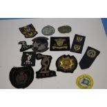 A BOX OF MOSTLY MILITARY BADGES