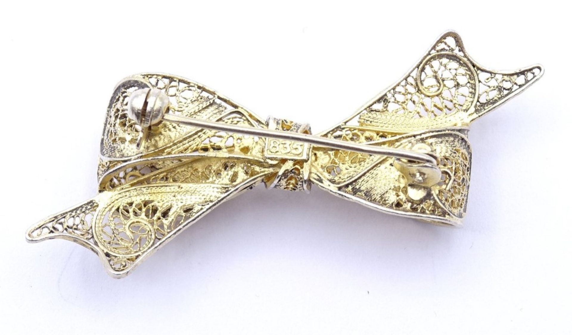 Filigrane Schleifenbrosche in Silber 0.835 leicht goldfarbenes Stück,L- 5,4cm, 5,0gr. - Bild 4 aus 4