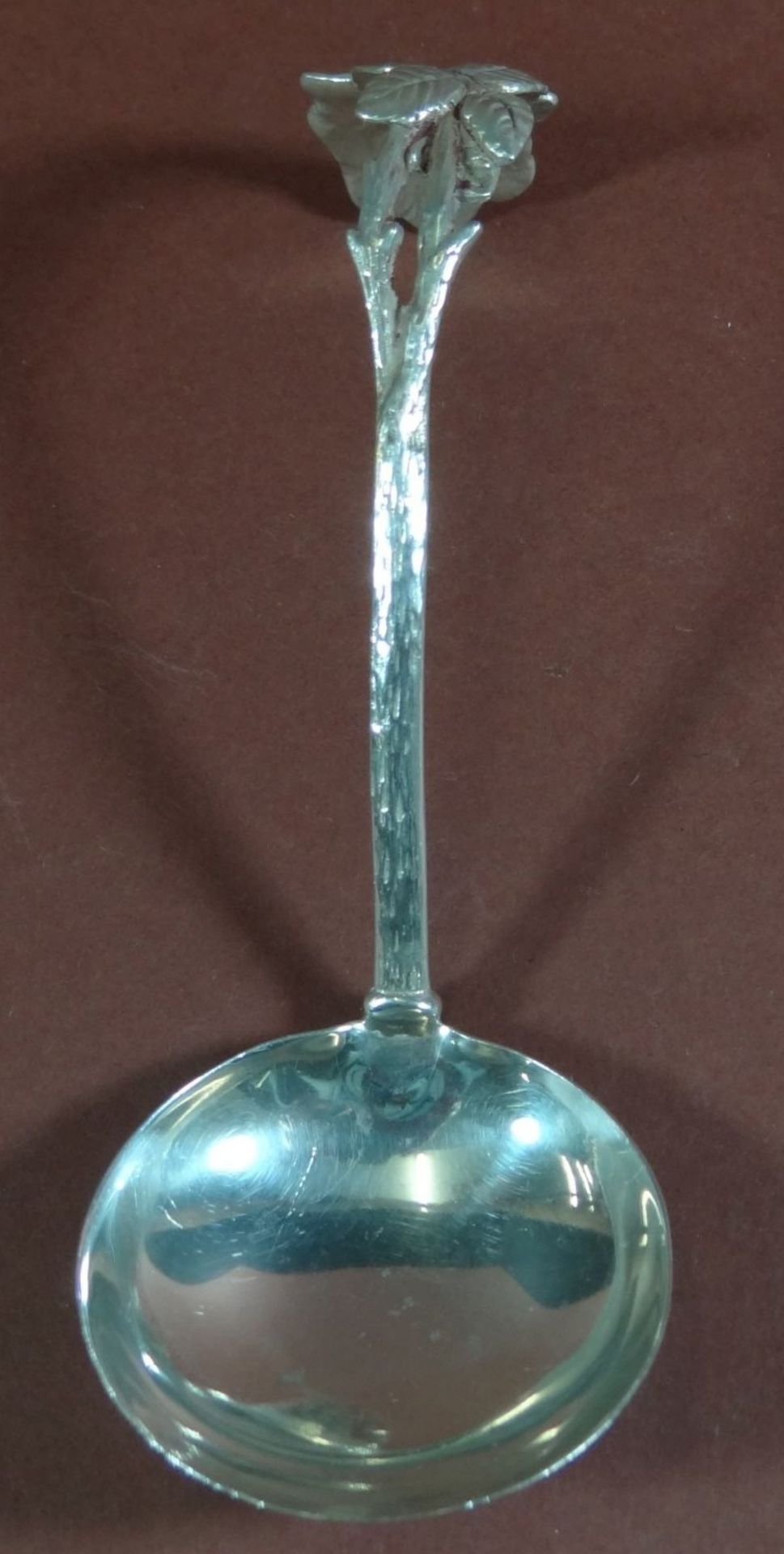 Gebogener Silber-Sahnelöffel, Rosenmuster, L-11 cm, 18 gr.