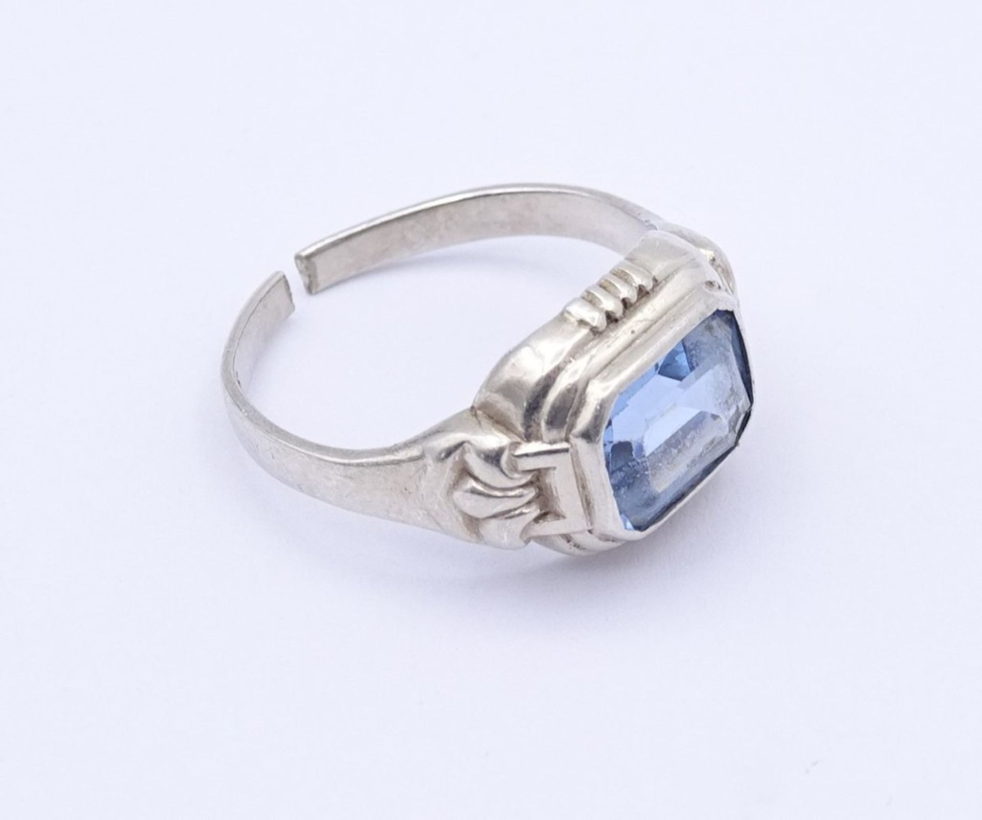 835er Silber Ring mit einen facc. hellblauen Stein,Schiene gebrochen, 3,4gr., RG 53/54 - Bild 6 aus 6