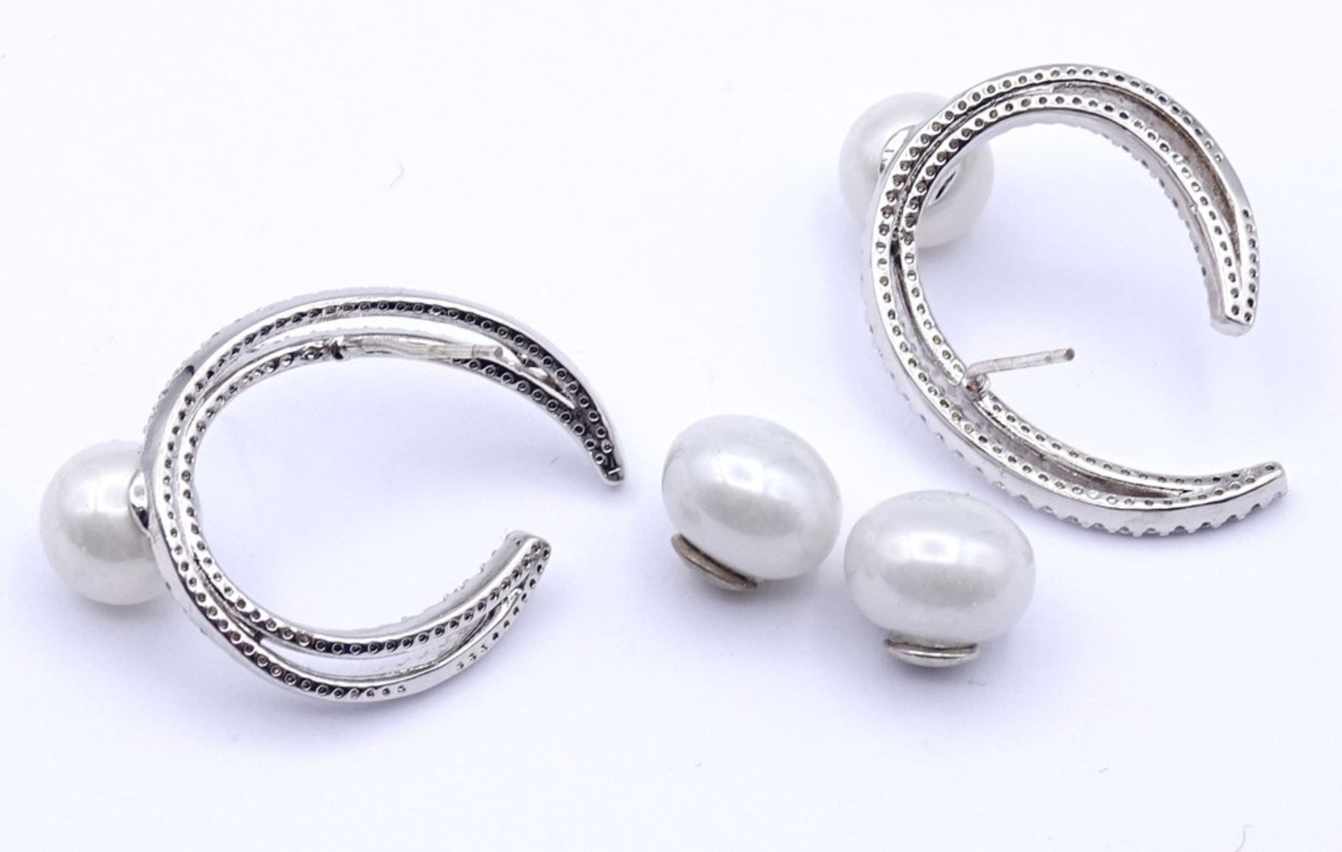 Paar Ohrstecker mit klaren Steinen und Perlen, Silber 0.925 zus.6,4gr., L- 2,7cm - Image 4 of 4