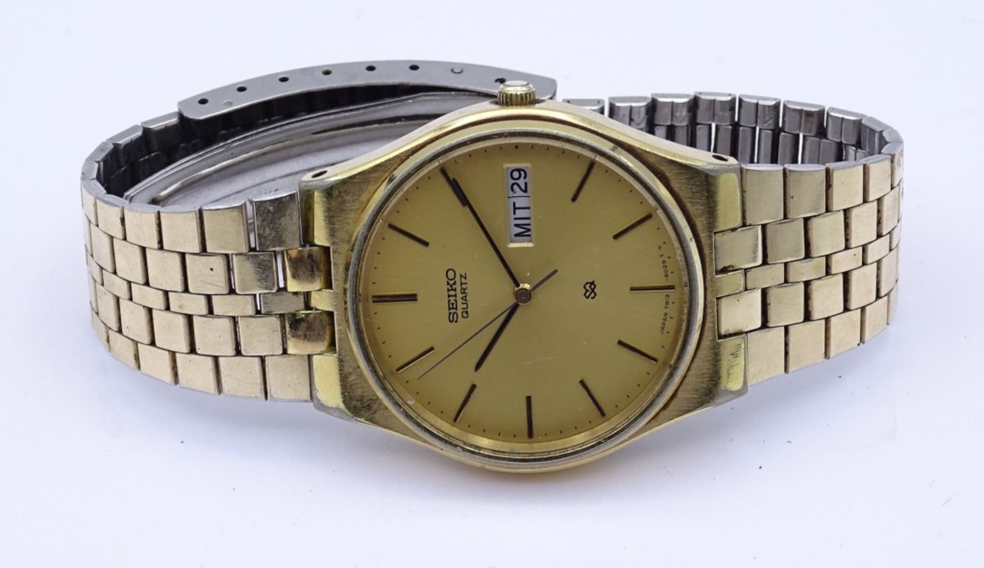 HAU "Seiko", S2, Quartz,D- 34mm,goldfarben,Alters-u. Gebrauchsspuren,Funktion nicht gepr.