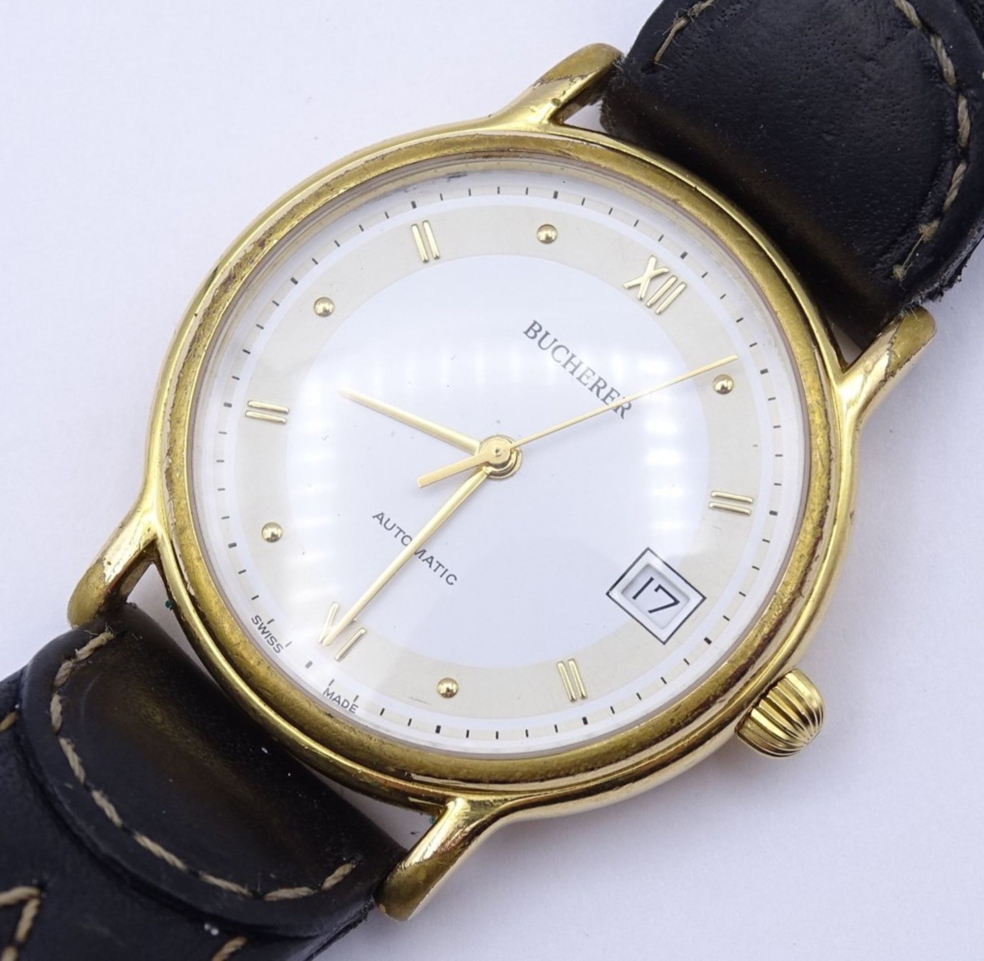 HAU "Bucherer",automatic,Werk läuft,D- 35mm,goldfarben,