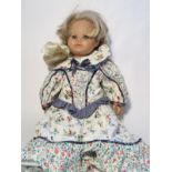 Puppe mit Schlafaugen, gemarkt "Z", H. 50 cm, Stoffkörper mit Kunststoffgliedern und -kopf