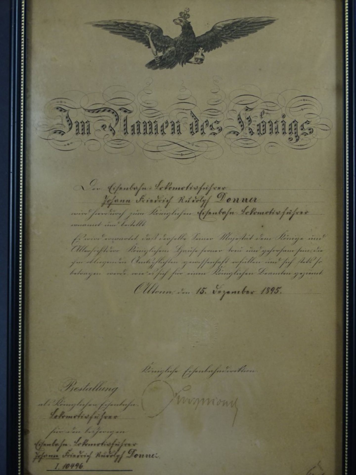 Bestallungsurkunde zum Lokomotivführer von 1895, "Eisenbahn-Direction Altona", gerahmt, 34,5x23 cm - Image 2 of 3