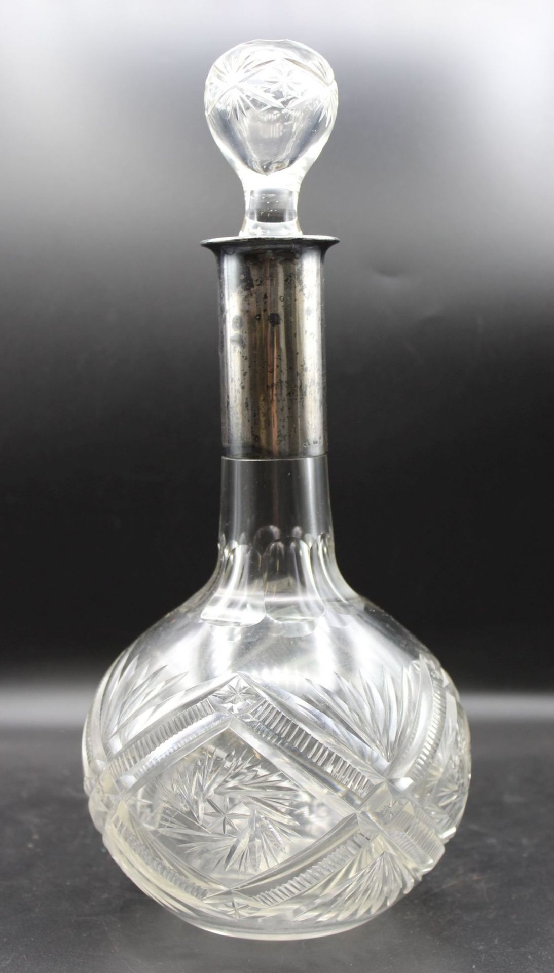 bauchige Karaffe, um 1900, Kristall beschliffen, Silbermontur -800-, H-30cm.