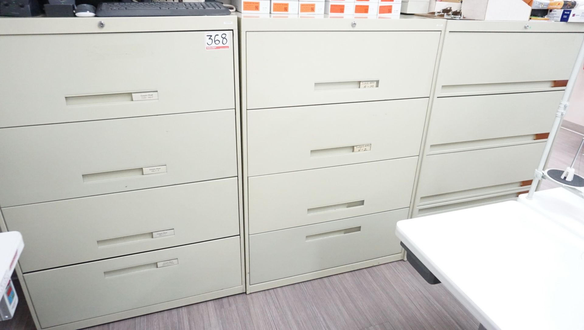 LOT - BEIGE 4-DRAWER LATERAL FILE CABINETS (4 UNITS)