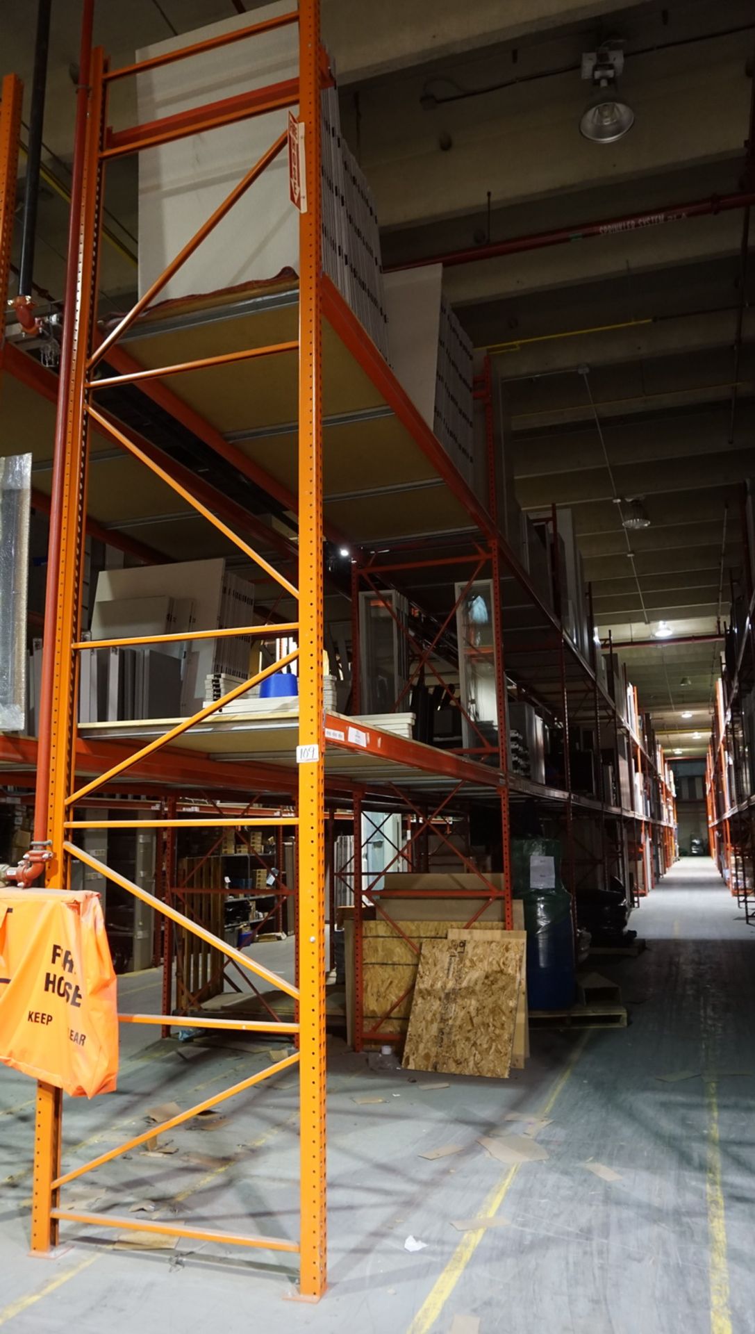 SECTIONS - ORANGE STEEL 4' X 12' X 18'H PALLET RACKING (68 STRINGERS TOTAL) (RIGGING FEE $40 / SECT