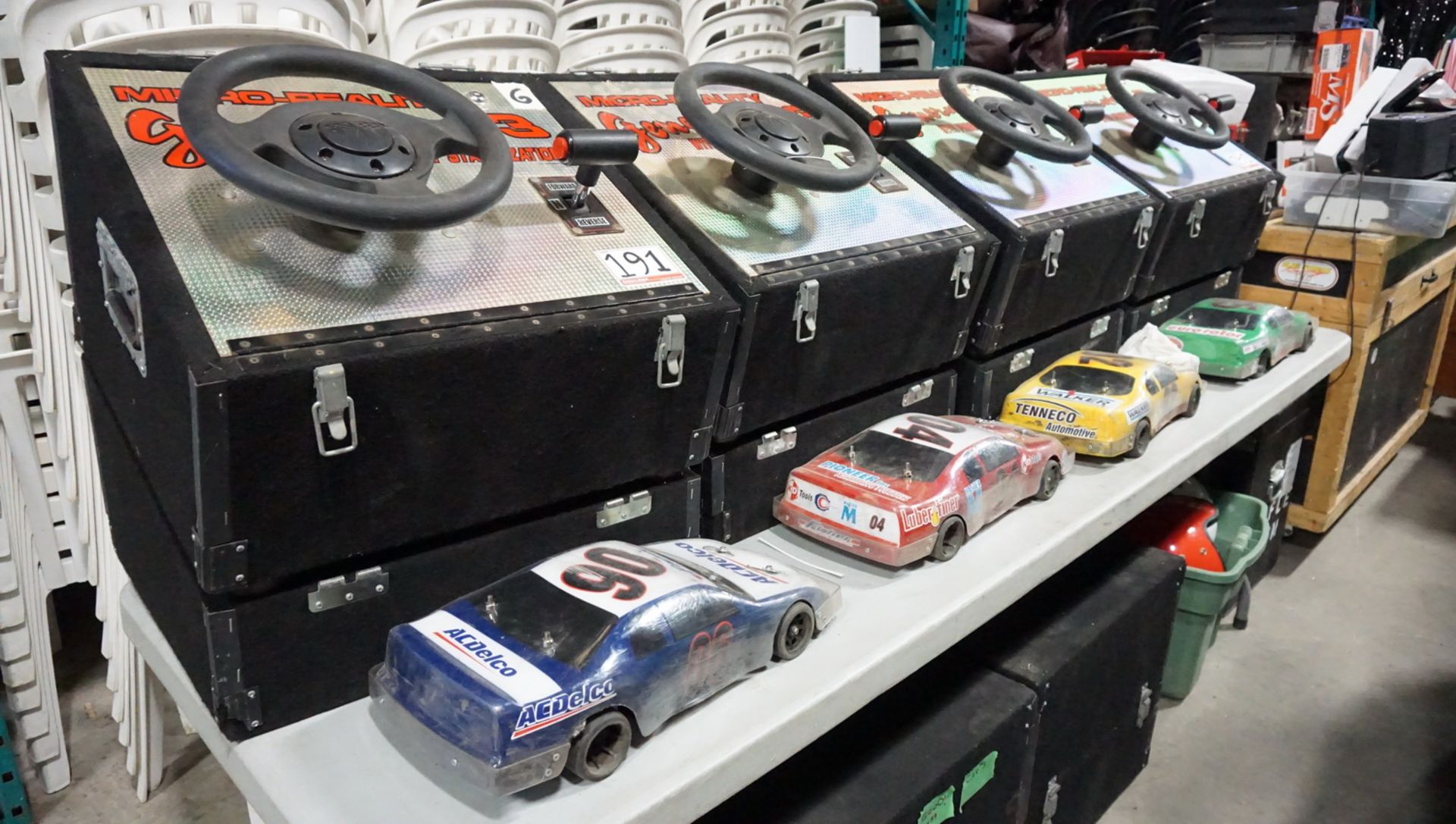 LOT - MICRO-REALITY STOCK CAR RACING GAME W/ (2) TRACKS, RC STOCK CARS, RC STEERING COLUMNS, ETC.