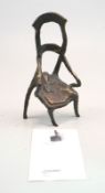 Marten, Norbert (1953 Lingen /Ems -Tätig in Oldenburg): "Der Stuhl",Bronzeplastik Monogrammiert "