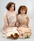 Zwei alte Puppen mit Lederkörpern,Lederkörper, 1x Arme und Kopf aus Porzellan, 1x Arme und Kopf
