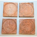 Sammlung von vier Siegelfliesen, 16.Jhd.,terracottafarbene Tonfliesen mit verschiedenen