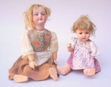 Zwei antike Puppen, Armand Marselle und Unis France,beide jeweils mit Porzellankopf, Massekörper,