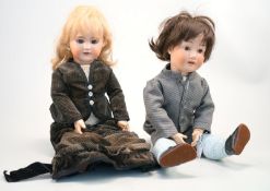 Zwei Puppen, Mädchen und Junge,verschiedene Hersteller: Trebor und DEP, beide Massekörper,