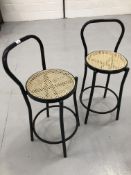 A pair of metal tube frame "bentwood" style bar stools.