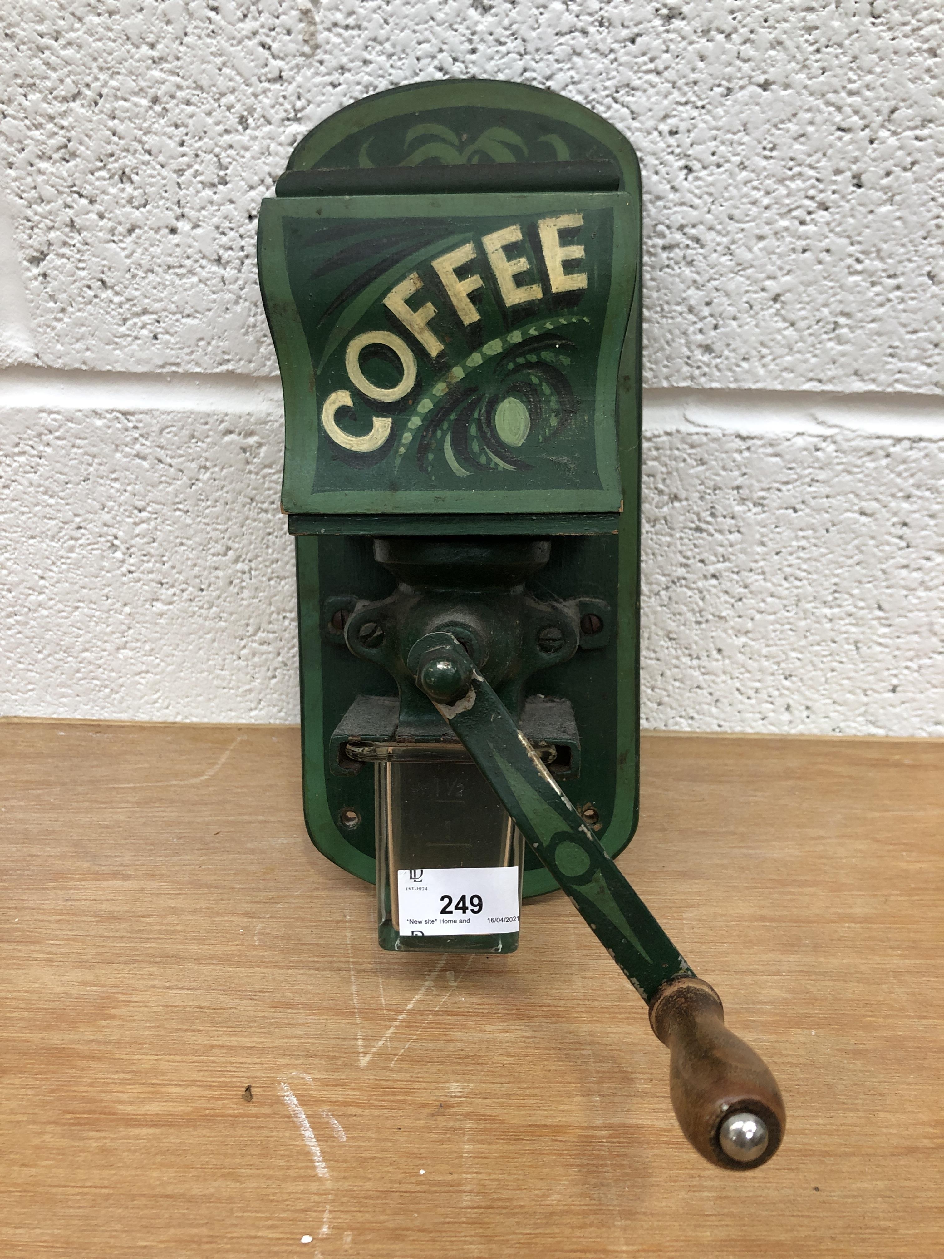 Wall mounted coffee grinder.