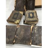 Two boxes of Victorian bibles.